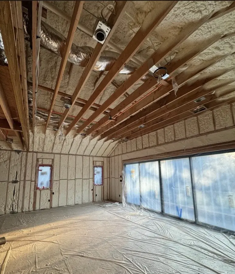 Interior walls and ceiling insulated with spray foam during new construction in Depew